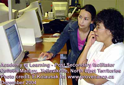 Computer Teaching Lab at Yellowknife's Post Secondary - Academy of Learning showing newly qualified Colleen MacKay working with student
